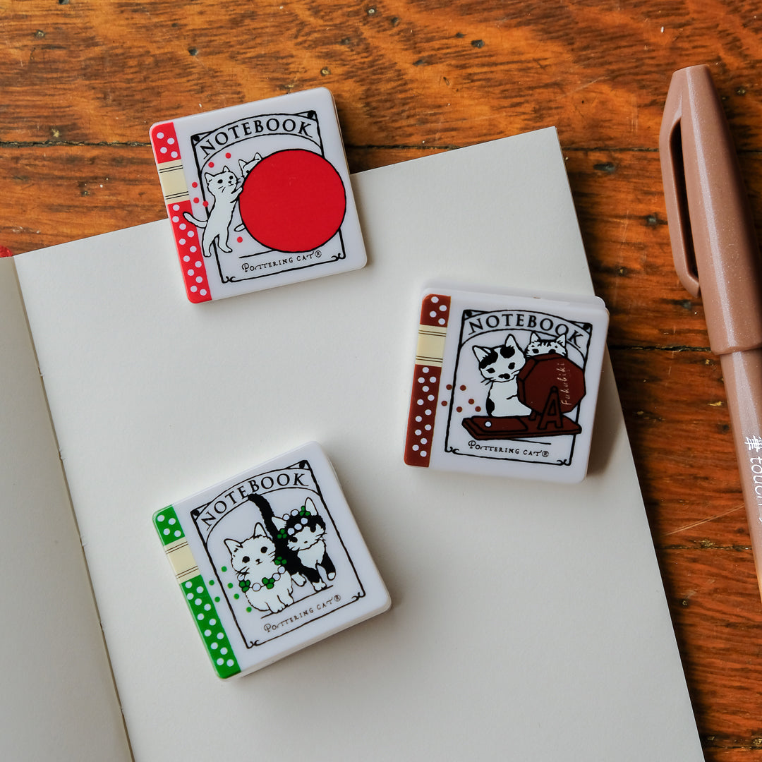 Pottering Cat - Stand Clip - Notebook