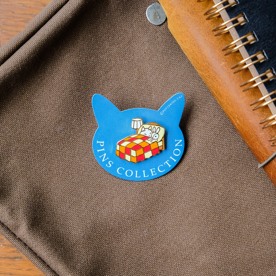 Pottering Cat - Badge - Bed