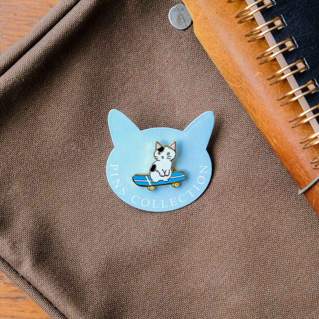 Pottering Cat - Badge - Skateboard 1