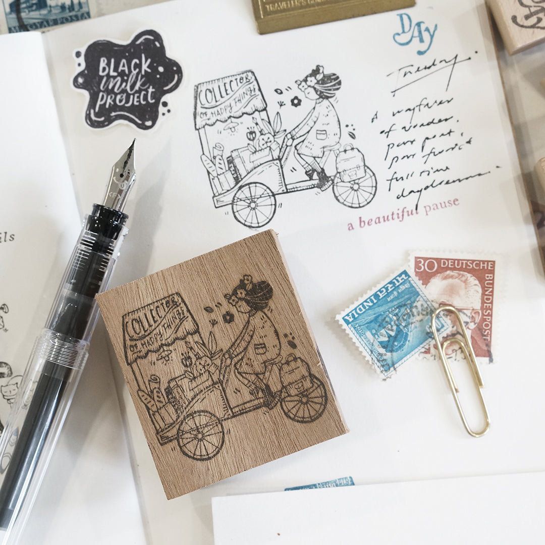 Pre Order: Black Milk Project Traveling Stationer Rubber Stamp - Girl on Cart BMP304